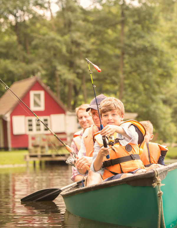 Family Fishing From Canoe