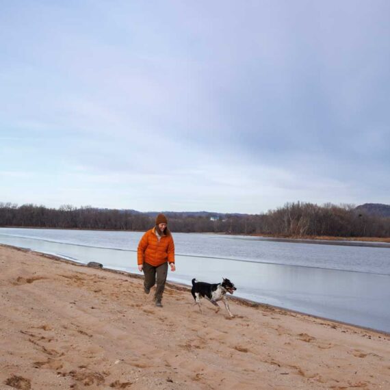 Marissa and Ottis hit the ground running at Airport Beach, one of La Crosse's dog-friendly beaches.